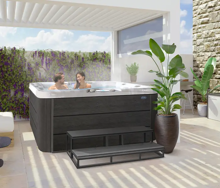 Hot Tubs, Spas, Portable Spas, Swim Spas for Sale Hot Tubs, Spas, Portable Spas, Swim Spas for Sale Calspas hot tub being used in a family setting